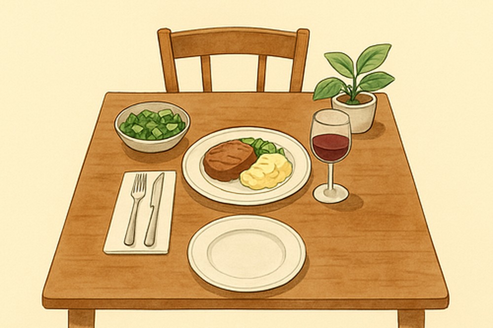 Italian table setting with a plate of food, cutlery and a glass of red wine